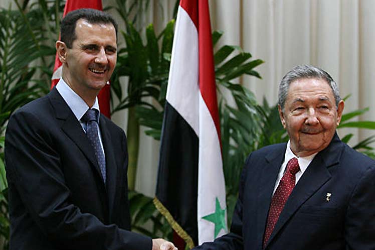 Bashar Al-Assad y Raúl Castro