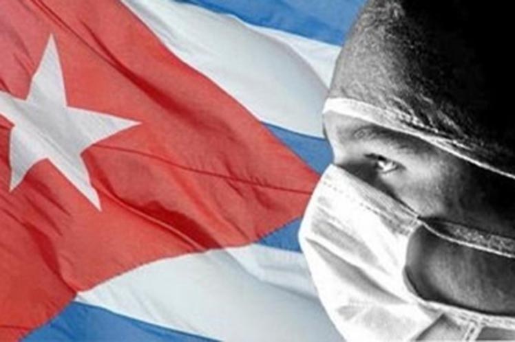 Bandera y médico cubano