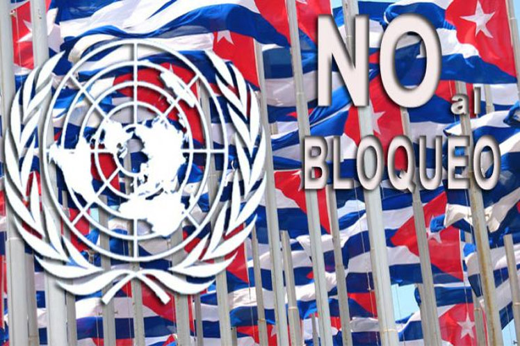 Banner alegórico a la campaña contra el bloqueo a Cuba