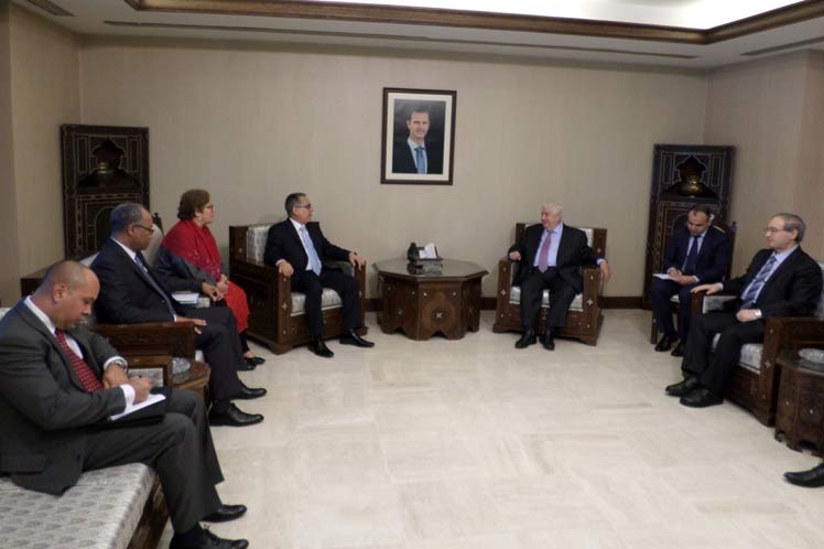  Ministro de Asuntos Exteriores y Expatriados de Siria, Walid Al-Moallem, y el viceministro primero de Relaciones Exteriores de Cuba, Marcelino Medina